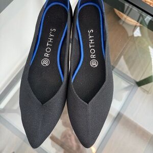 Rothy's Black Pointed Flats with Blue Trim